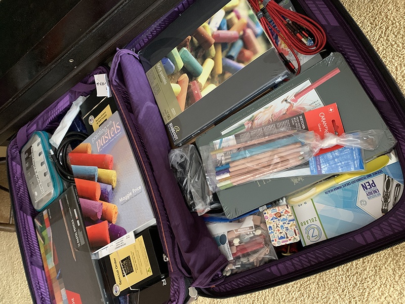 Pastel supplies in suitcase
